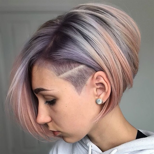 Asymmetrical Short Hairstyles for Colorful Hair  If you want a change in your hair, color them a little. A very beautiful appearance will be created. Pink and its shades go very well with platinum hair.