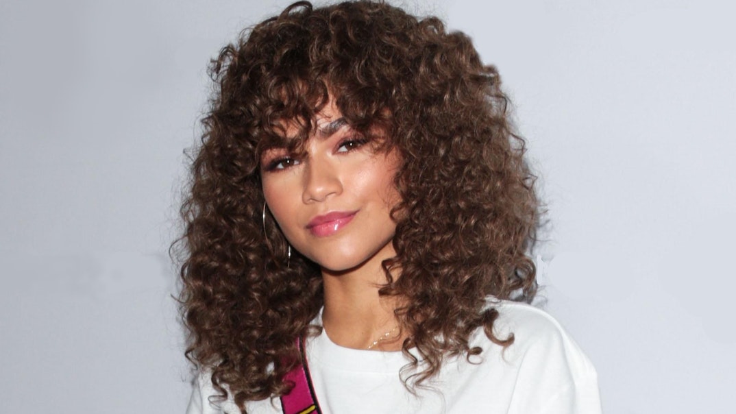 Curly Hairstyles with Bangs 2021